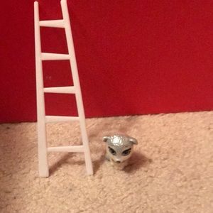 Ladder and a toy puppy